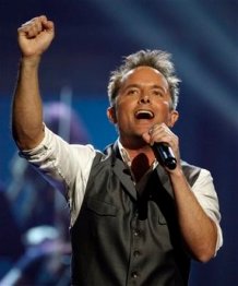 Chris Tomlin performs at the Dove awards in Nashville, Tenn., Thursday, April 23, 2009. The Dove awards honor Christian and gospel music. (AP Photo/Mark Humphrey)